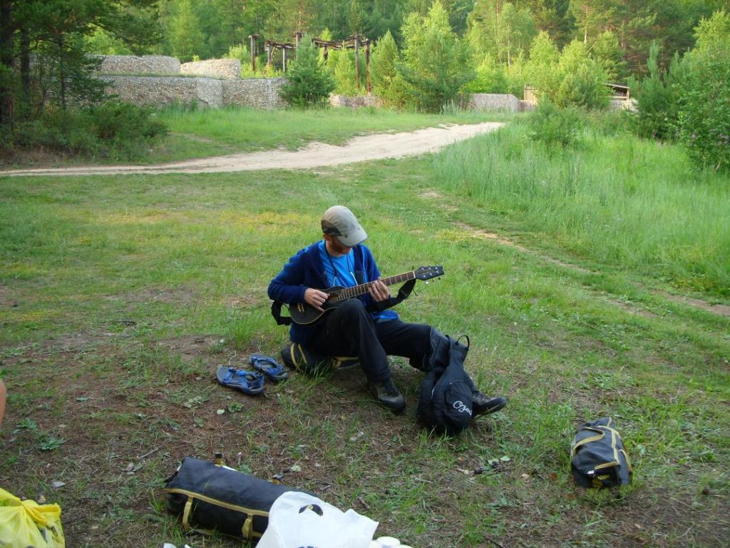 Playing guitar on the bank of Lake Baikal